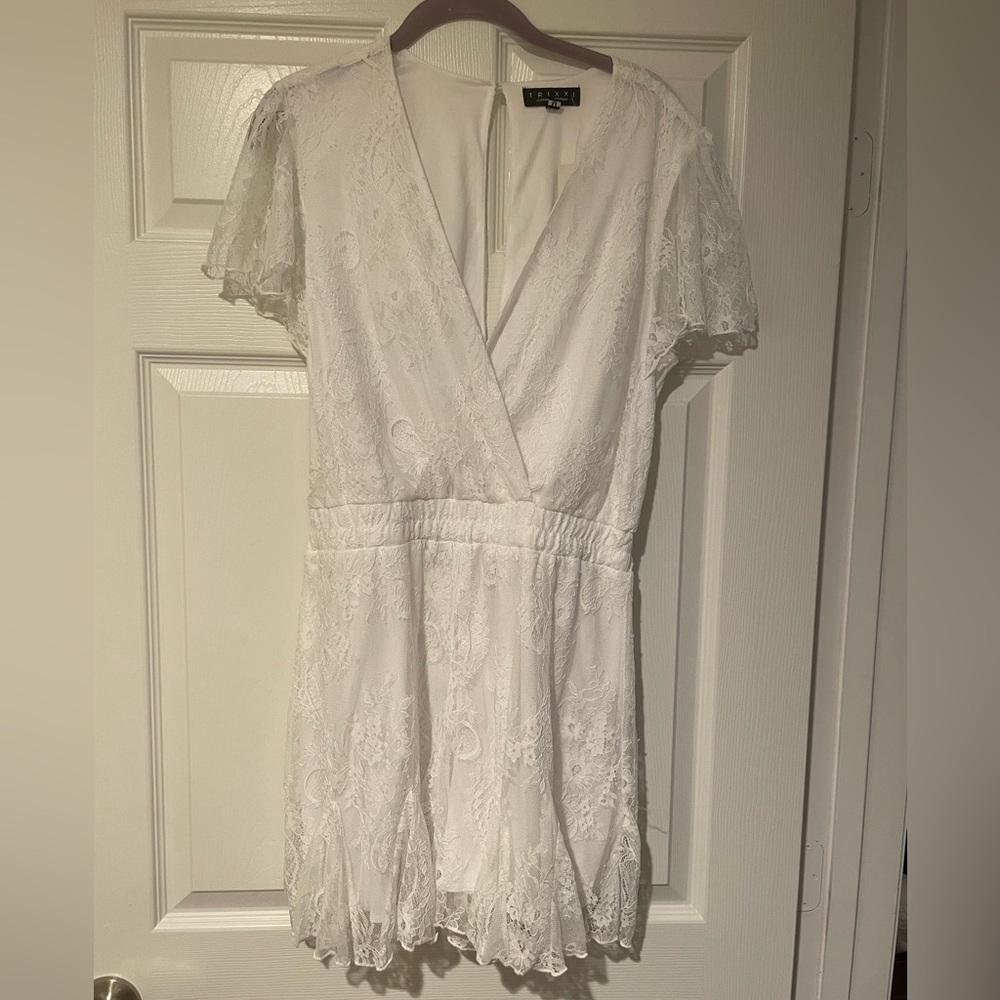 Francesca’s trixxi white romper with tags